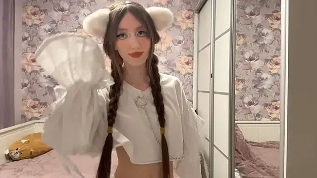 NyxoraX — Tease my black top for tits